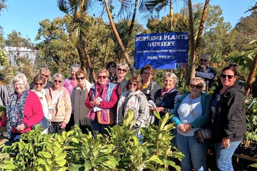 members in group photo on club excursion